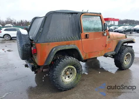 2000 Jeep Wrangler Sport z USA, uszkodzony, nr VIN 1J4FA49S0YP802693
